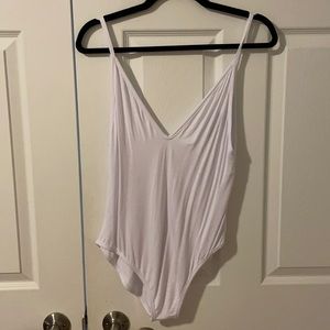 White bodysuit with snap closures